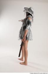 LUCI_AVIOL STANDING POSE WITH TWO GUNS